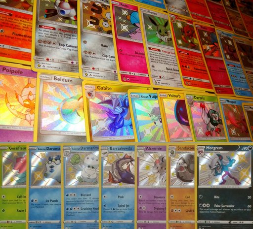 20 x GLIMMENDE Pokémon (35% KORTING) Holo/Glitter/EX/FULL-ART - DePokemonShop.nl